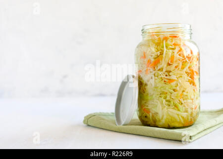 Sealed jar with tasty sauerkraut Stock Photo