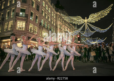 Regent Street, London, UK, 15th Nov 2018. The ballet dancers from Black Orchid showcase a surprise performance. The official ‘switch-on’ of the largest lights installation in the capital, Regent Street’s ‘The Spirit of Christmas’ is celebrated once again in style. Credit: Imageplotter News and Sports/Alamy Live News Stock Photo