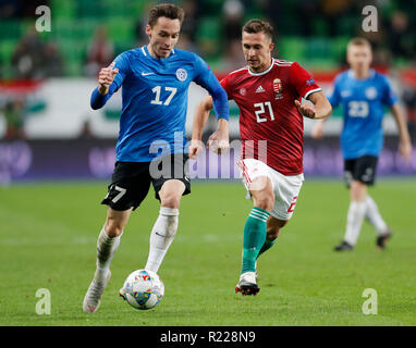 Budapest, Hungary. 15th November, 2018. (l-r) Siim Luts of Estonia competes for the ball with Dominik Nagy of Hungary during the UEFA Nations League group stage match between Hungary and Estonia at Groupama Arena on November 15, 2018 in Budapest, Hungary. Credit: Laszlo Szirtesi/Alamy Live News