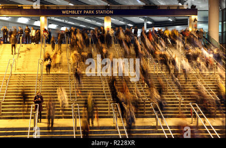 London, UK. 15th November, 2018. People make their way down the steps at Wembley Park Underground Stadium before the England v USA game (Wayne Rooney's last England game) at Wembley Stadium, London, November 15, 2018. Credit: Paul Marriott/Alamy Live News Stock Photo