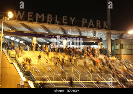 London, UK. 15th November, 2018. People make their way down the steps at Wembley Park Underground Stadium before the England v USA game (Wayne Rooney's last England game) at Wembley Stadium, London, November 15, 2018. Credit: Paul Marriott/Alamy Live News Stock Photo