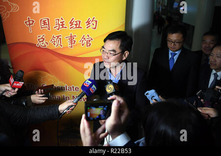 New York, USA. 15th Nov, 2018. Huang Ping (C), new Chinese consul-general in New York, speaks at a press briefing upon his arrival at New York's John F. Kennedy International Airport, the United States, on Nov. 15, 2018. The Chinese Consulate-General in New York will continue to be dedicated to promoting China-U.S. ties through boosting regional cooperation, the newly-arrived Chinese consul-general said here on Thursday. Credit: Li Rui/Xinhua/Alamy Live News Stock Photo