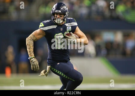 Seattle Seahawks tight end Nick Vannett (81) celebrates with a fan after he  scored a touchdown against the Kansas City Chiefs during the first half of  an NFL football game, Sunday, Dec.