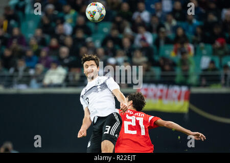 Leipzig, Germany. 15th Nov, 2018. Germany's Jonas Hector (L) vies with Russia's Aleksandr Erokhin during an international friendly match in Leipzig, Germany, Nov. 15, 2018. Germany won 3-0. Credit: Kevin Voigt/Xinhua/Alamy Live News Stock Photo