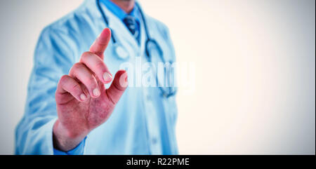 Midsection of doctor touching digital screen Stock Photo