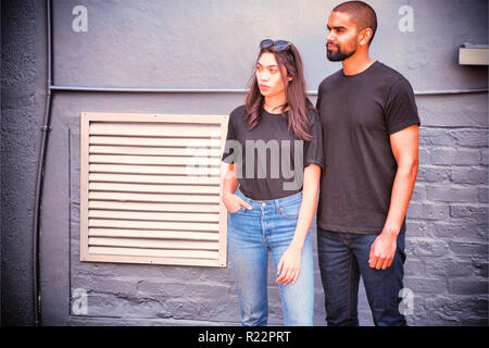 Hipster couple with blank t-shirts for your design Stock Photo