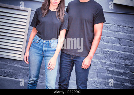 Hipster couple with blank t-shirts for your design Stock Photo