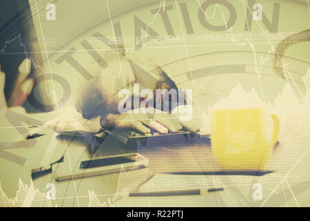 Composite image of motivation text with graphs and compass Stock Photo