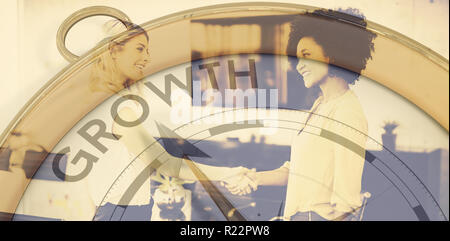 Composite image of compass pointing to growth Stock Photo