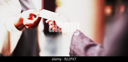 Business executives exchanging business card Stock Photo
