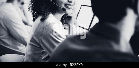 Customer service executive working at office Stock Photo