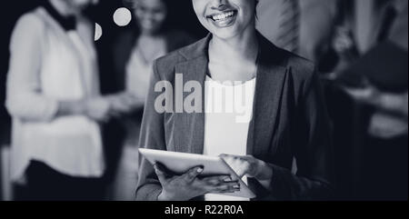 Businesswoman using digital tablet Stock Photo