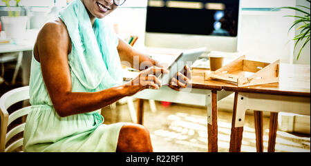 Business executive using digital tablet Stock Photo