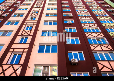 Modern architecture apartment's wall facade with windows. Stock Photo