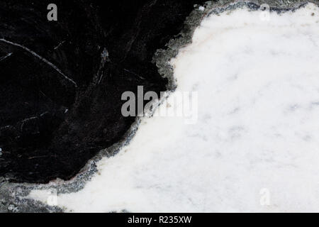 Black and white marble texture with grey in the middle. Stock Photo