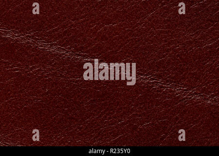 Shiny leather texture with contrast dark red surface. Stock Photo
