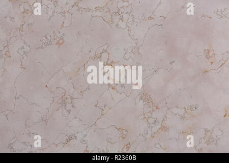 Beige, light pink marble texture on macro. Stock Photo