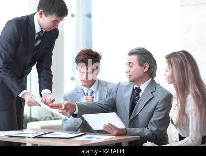 assistant shows the boss the business document.photo with copy space Stock Photo
