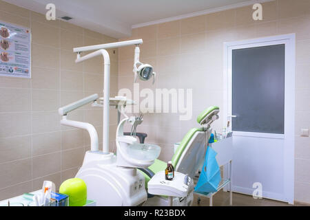 Modern dental room. Dentists chair and tools. Dental care, dental hygiene, checkup and therapy concept. Stock Photo