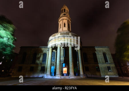 London, England, UK - October 12, 2018: The tower and south face of St Mary's Church is lit at night in Bryanston Square in the Marylebone neighbourho Stock Photo