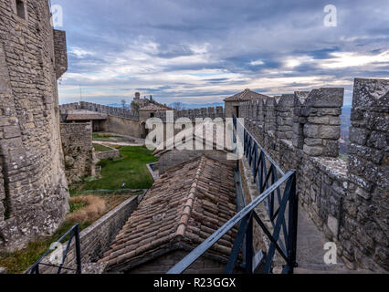 Battlements with medieval castle and walls in San Marino Stock Photo