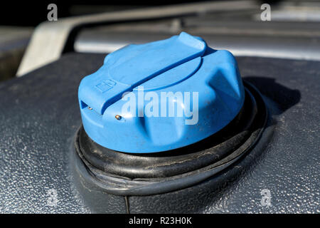 Diesel exhaust fluid tank of a truck Stock Photo