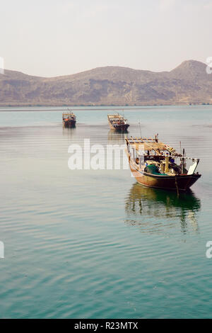 Sur town, old traditional omani wooden boat (dhow) in the harbor, Sultanate of Oman. Stock Photo