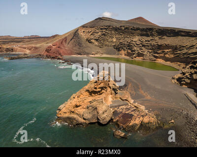 Aerial view of the Charco de los Clicos, a small salt-water lake with an emerald green color set. Lanzarote, Canary Islands, Spain Stock Photo