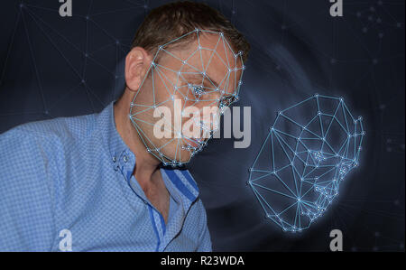 Biometric verification - young man face recognition concept Stock Photo