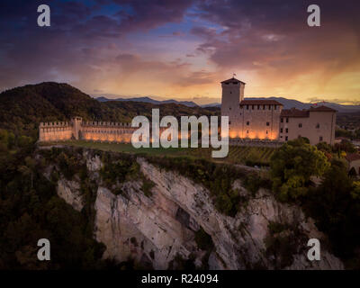 Aerial sunrise image of medieval Angera castle in Lombardy Italy above the Lake Maggiore Stock Photo