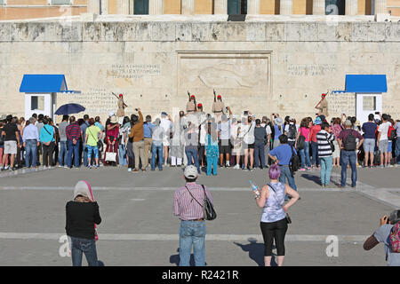 Athens, Greece - May 04, 2015: Bunch of Tourists in Front of Hellenic Parliament Building During Changing Guard Ceremony in Athens, Greece. Stock Photo