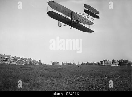 Orville Wright pilots an early aeroplane. 1905 Stock Photo