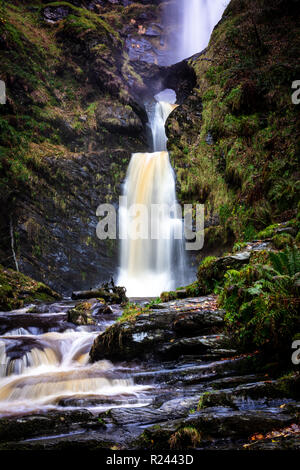 Autumn image of Pistyll Rhaeadr Waterfall in Powys, Mid Wales. High resolution and long exposure for unique colours and capturing the motion and power Stock Photo