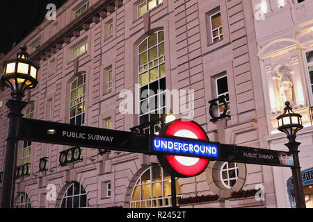 LONDON, UNITED KINGDOM  - NOVEMBER 12, 2018: Piccadilly Circus Station, illuminated entrance sign to world famous London Underground. Stock Photo