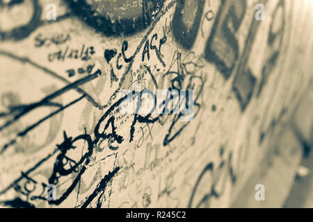 A section of graffiti on the world famous East Side Gallery at the Berlin Wall, Berlin, Germany. Stock Photo