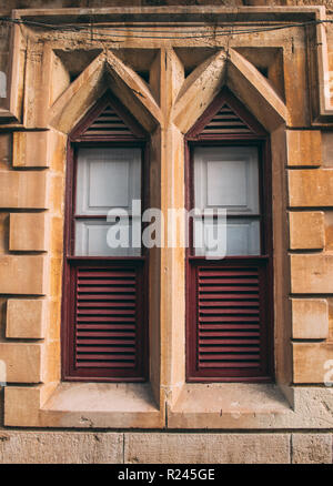 Maltese old blue window with curtains, Malta Stock Photo