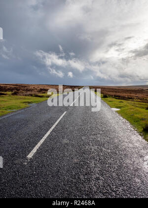 An empty, open road in wet weather in Exmoor National Park Devon UK Stock Photo