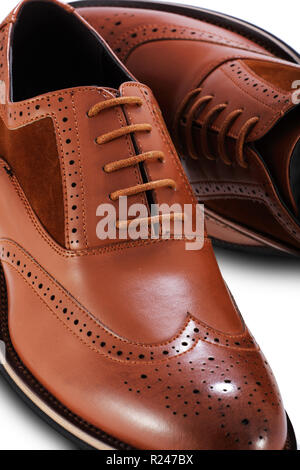 Men's brown brogue leather shoes on a white background Stock Photo