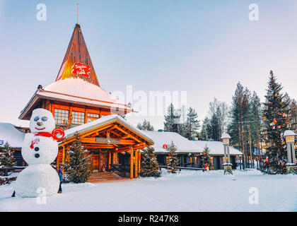 Rovaniemi, Finland - March 5, 2017: Snowman and Santa Claus Office in Santa Claus Village in Rovaniemi in Lapland in Finland. Stock Photo