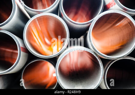 Sewage pipes made of plastic with backlighting Stock Photo