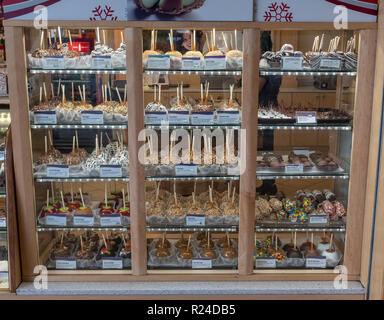 window display of candy apples and other confectioneries Stock Photo