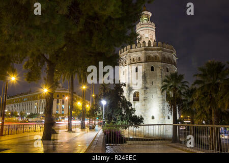 Tower of Gold (Torre del Oro) medieval military watchtower at night, Seville, Spain Stock Photo