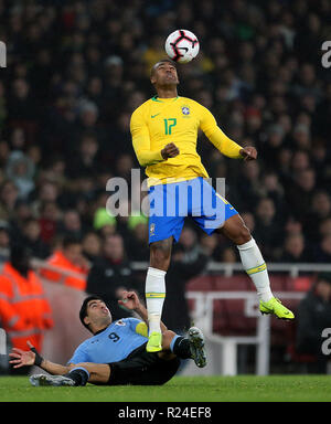 Uruguay's Luis Suarez (left) and Brazil's Walace (right) battle for the ball during the International Friendly match at the Emirates Stadium, London. Stock Photo