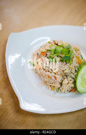 Fresh prepared malaysian Nasi Kerabu fried rice with vegetables in local restaurant in Kuala Kangsar. Traditional asian cuisine made of fresh ingredie Stock Photo