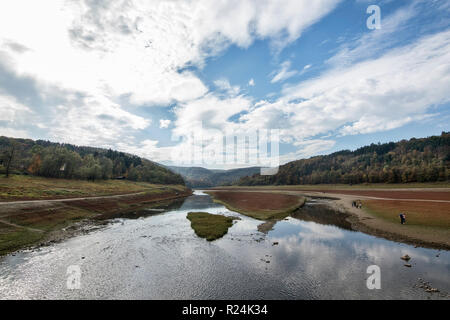 The almost dry riverbed at Edersee Lake in Kellerwald-Edersee National Park. Stock Photo