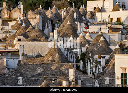 Rooftops of conical trulli houses in Rione Monti district, view from Belvedere Santa Lucia, view point in Alberobello, Apulia, Italy Stock Photo