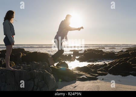 Couple having fun on the beach Stock Photo