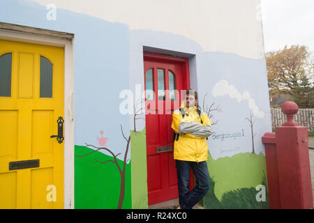 Reykjavik, Iceland - October 12, 2017: man stand at apartment. Bearded man travel abroad. Active man rent apartment house. Travel to meet yourself. Stock Photo