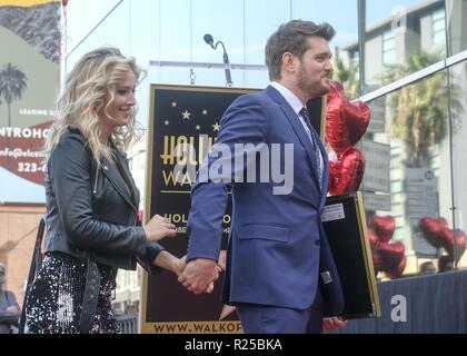 Los Angeles, California, USA. 16th Nov, 2018. Singer Michael Buble and his wife Luisana Lopilato attends his star ceremony on the Hollywood Walk of Fame Star where he was the recipient of the 2,650th star on the Hollywood Walk of Fame in the category of Recording on November 16, 2018 in Los Angeles. Credit: Ringo Chiu/ZUMA Wire/Alamy Live News Stock Photo