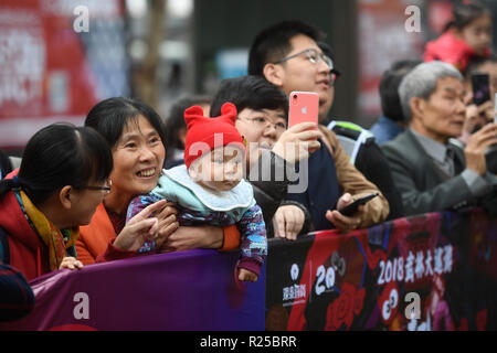 Hangzhou, China's Zhejiang Province. 17th Nov, 2018. Citizens watch a parade held in Hangzhou, east China's Zhejiang Province, Nov. 17, 2018. Credit: Huang Zongzhi/Xinhua/Alamy Live News Stock Photo